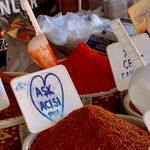Colorful spices on display in a bustling Turkish market, capturing aromatic charm.